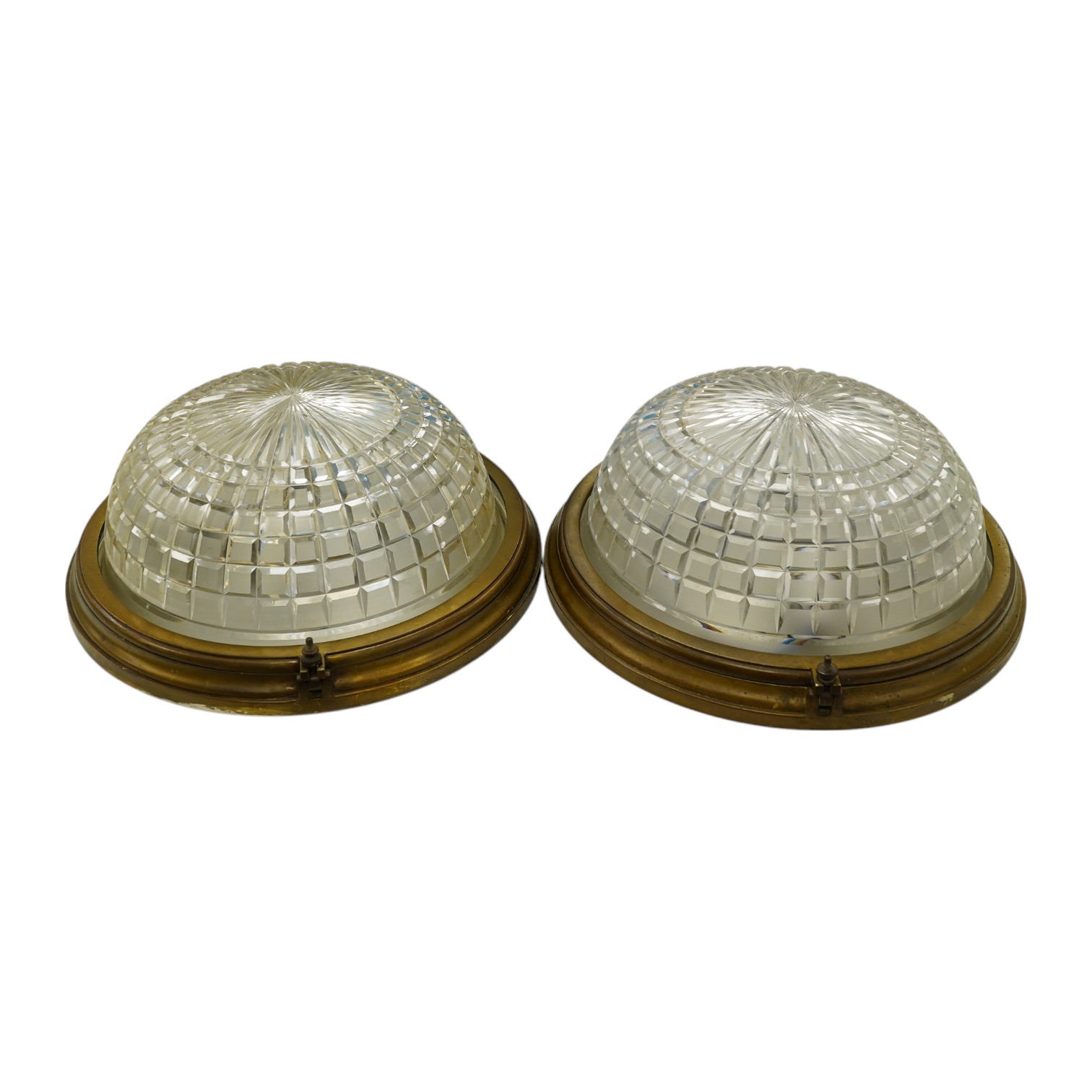 A pair of cast brass and cut glass ceiling domes, by repute from old Stock Exchange, 37cm in diameter. Condition - fair to good